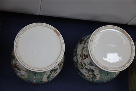 A pair of Chinese famille rose jars and covers, late 19th century, H. 45.5cm